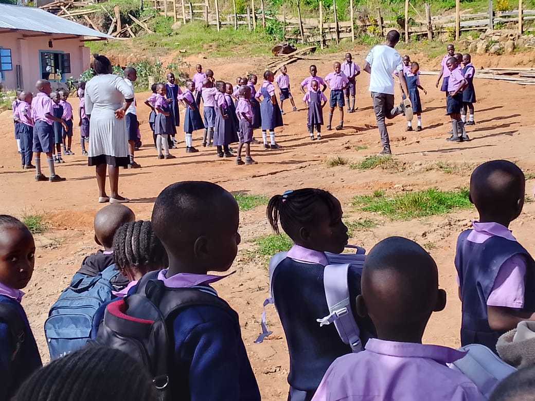 Pre-primary and lower primary learners lining up for morning parade
